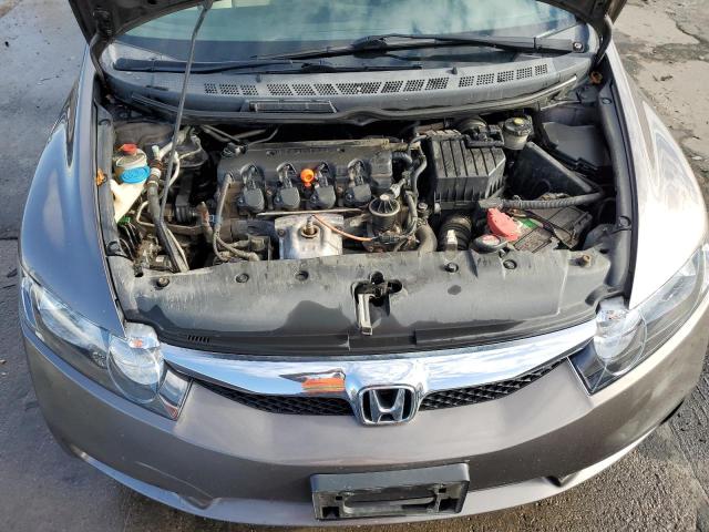 Photo 11 from auction – 2011 HONDA CIVIC LX with VIN 19XFA1F58BE020393
