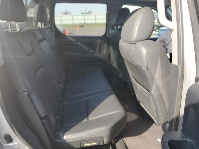 Photo 10 from auction – 2014 HONDA RIDGELINE with VIN 5FPYK1F67EB011723
