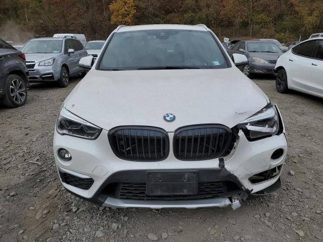 Photo 5 from auction – 2016 BMW X1 XDRIVE2 with VIN WBXHT3C3XG5F66641