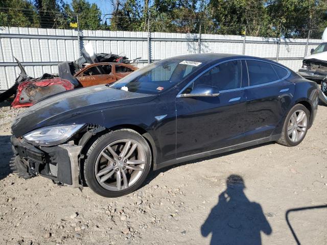 TESLA MODEL S 2014 with VIN 5YJSA1H10EFP51648 - Photo from auction