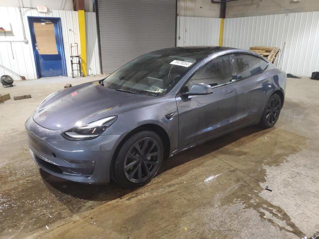 TESLA MODEL 3 2022 with VIN 5YJ3E1EB9NF335622 - Photo from auction