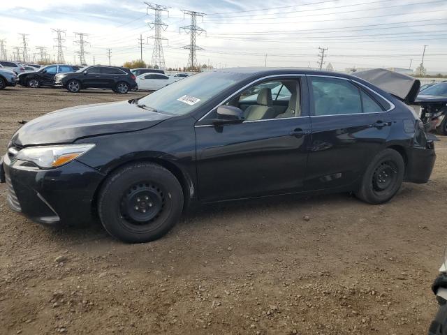 TOYOTA CAMRY LE 2017 with VIN 4T1BF1FK7HU677410 - Photo from auction