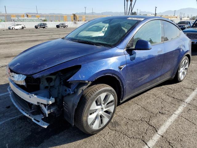 TESLA MODEL Y 2023 with VIN 7SAYGDEE9PA165745 - Photo from auction
