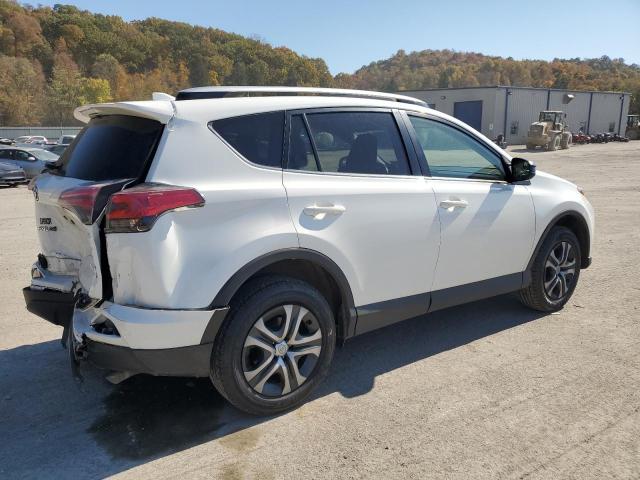 Photo 3 from auction – 2016 TOYOTA RAV4 LE with VIN JTMZFREV3GJ097536