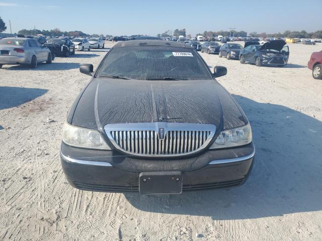 Photo 5 from auction – 2004 LINCOLN TOWN CAR E with VIN 1LNHM81W64Y688534