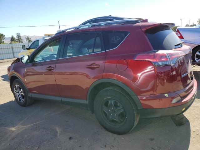 Photo 2 from auction – 2018 TOYOTA RAV4 LE with VIN 2T3BFREV6JW829569