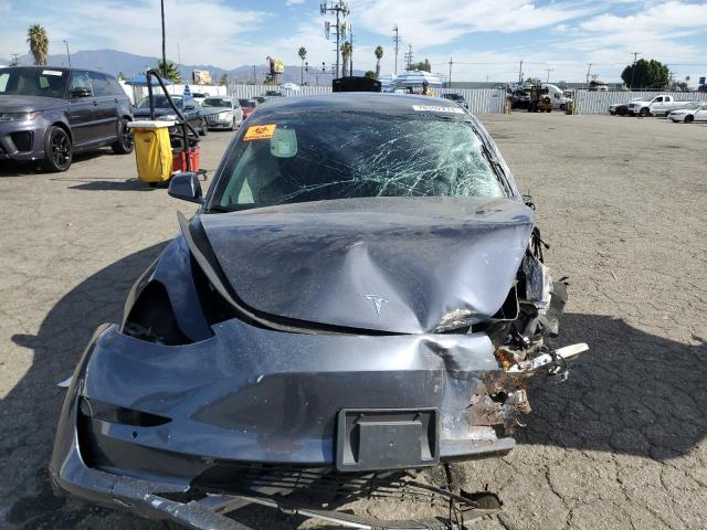 Photo 5 from auction – 2022 TESLA MODEL 3 with VIN 5YJ3E1EB5NF253600