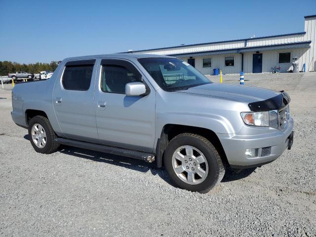 Photo 4 from auction – 2011 HONDA RIDGELINE with VIN 5FPYK1F46BB002232