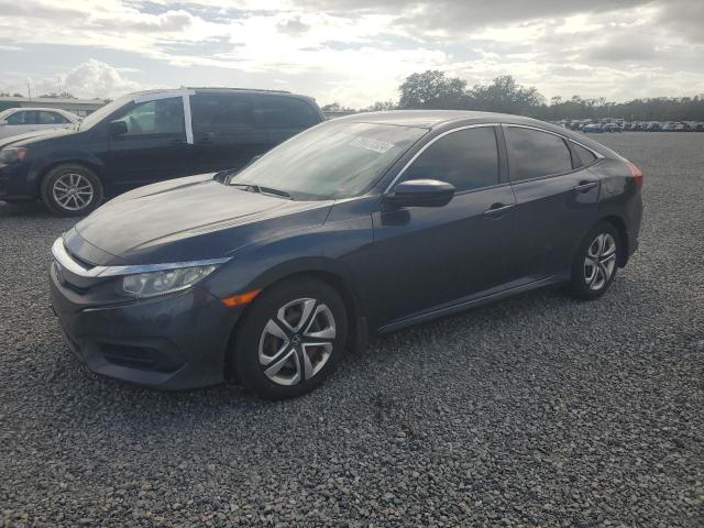 HONDA CIVIC LX 2018 with VIN 2HGFC2F59JH574112 - Photo from auction