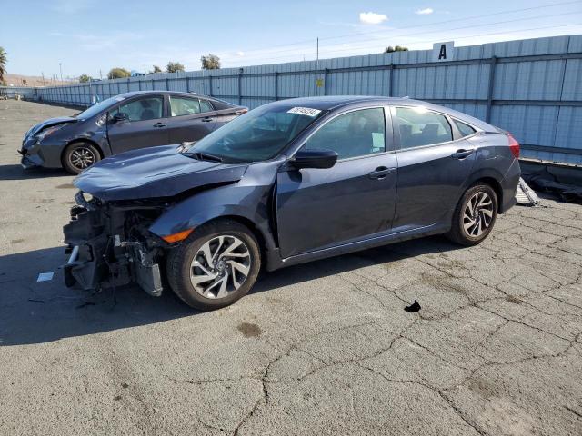 Photo 1 from auction – 2018 HONDA CIVIC EX with VIN 2HGFC2F70JH571732