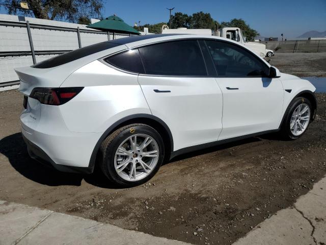 Снимка 3 от търг – 2023 TESLA MODEL Y с VIN 7SAYGDEE5PA039544