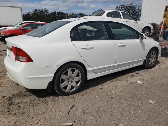Photo 3 from auction – 2011 HONDA CIVIC LX with VIN 19XFA1F50BE042856