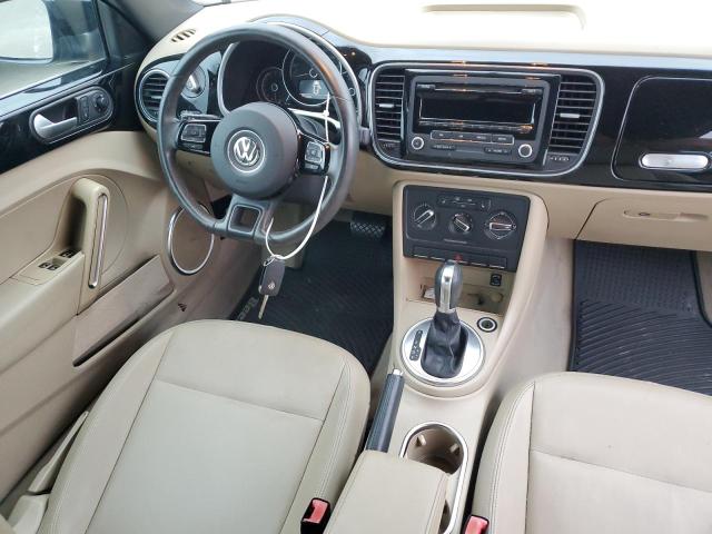 Photo 8 from auction – 2014 VOLKSWAGEN BEETLE with VIN 3VW507AT4EM819943
