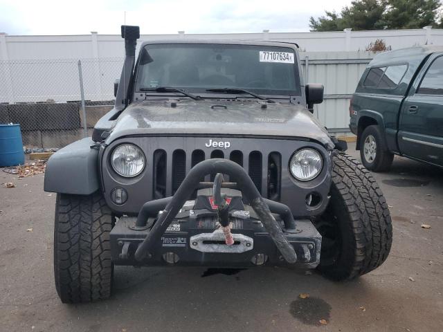 Photo 5 from auction – 2016 JEEP WRANGLER U with VIN 1C4BJWDG1GL303877