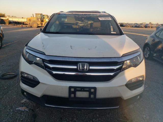 Photo 5 from auction – 2017 HONDA PILOT ELIT with VIN 5FNYF6H00HB042190