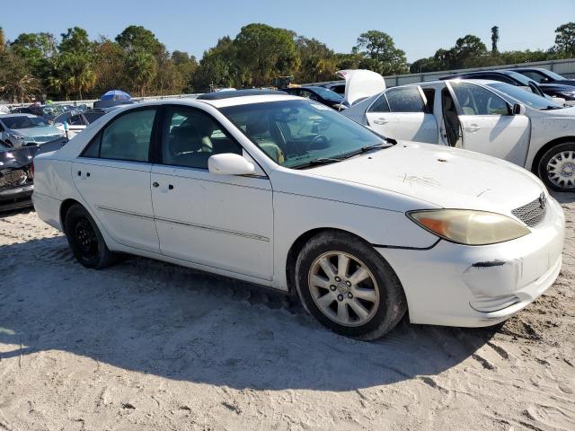 Foto 4 de la subasta – 2002 TOYOTA CAMRY LE con VIN 4T1BF32K82U024643