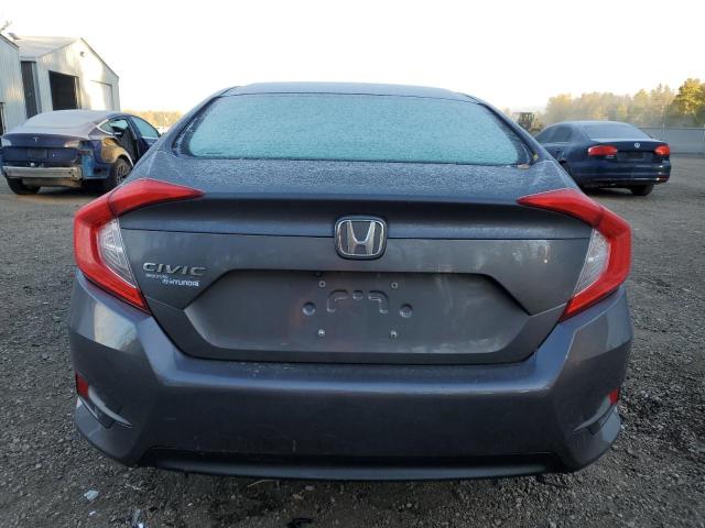 Photo 6 from auction – 2018 HONDA CIVIC EX with VIN 2HGFC2F80JH020693