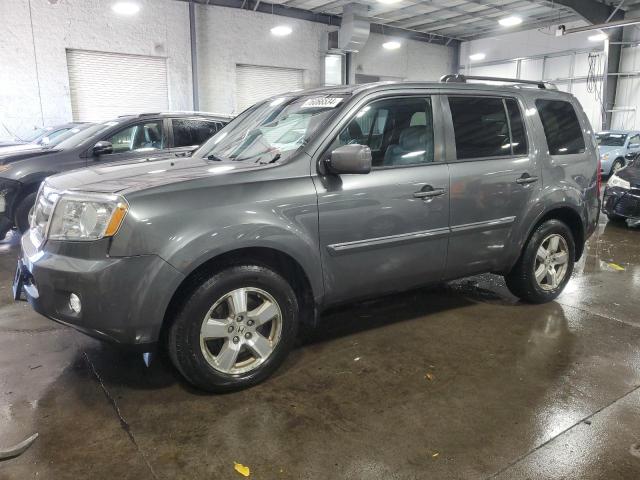 HONDA PILOT EXL 2011 with VIN 5FNYF4H50BB032783 - Photo from auction