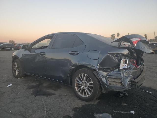 Photo 2 from auction – 2014 TOYOTA COROLLA L with VIN 2T1BURHE3EC101693