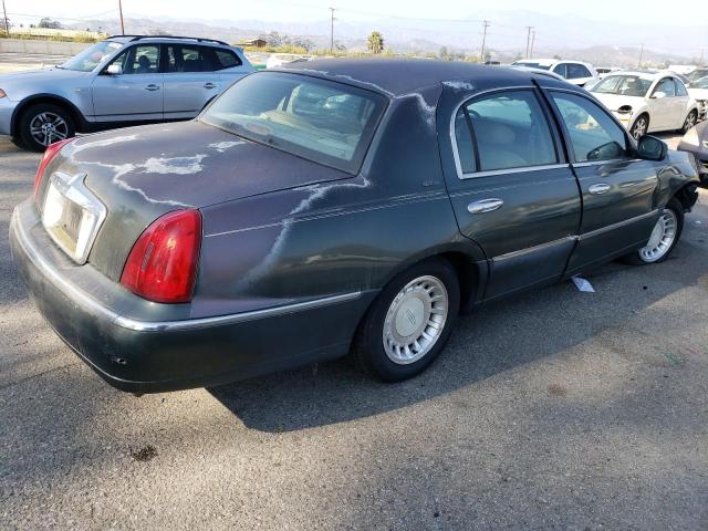 Photo 3 from auction – 2000 LINCOLN TOWN CAR E with VIN 1LNHM81W9YY938225