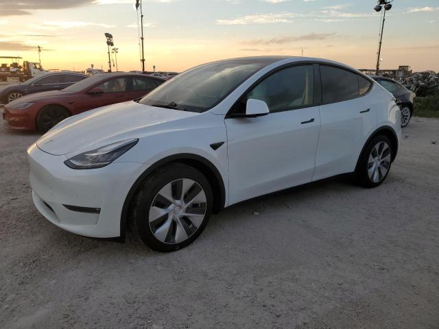 TESLA MODEL Y 2022 with VIN 7SAYGAEE1NF468064 - Photo from auction