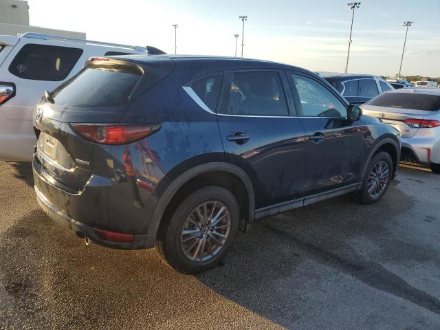 Photo 3 from auction – 2021 MAZDA CX-5 TOURI with VIN JM3KFACMXM0461490