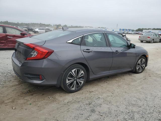 Photo 3 from auction – 2017 HONDA CIVIC EX with VIN 19XFC1F34HE002054