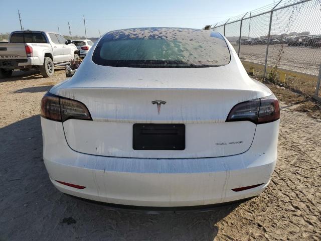 Photo 6 from auction – 2021 TESLA MODEL 3 with VIN 5YJ3E1EB9MF035738
