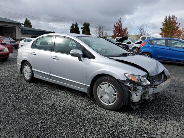 Photo 4 from auction – 2010 HONDA CIVIC HYBR with VIN JHMFA3F23AS002606