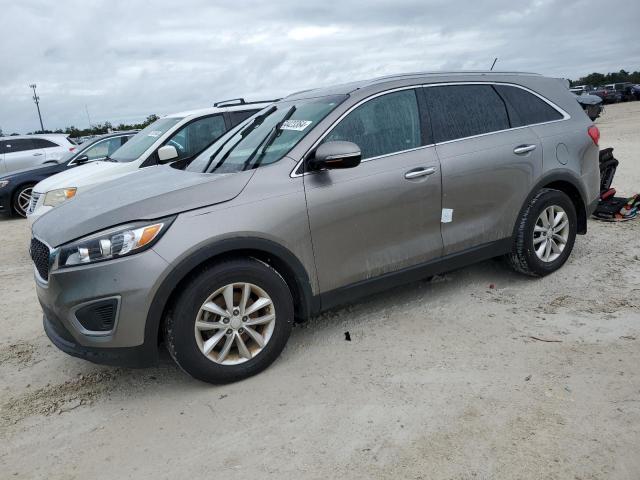 KIA SORENTO LX 2016 with VIN 5XYPG4A57GG094037 - Photo from auction