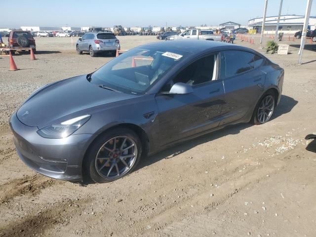 TESLA MODEL 3 2021 with VIN 5YJ3E1EB5MF869277 - Photo from auction