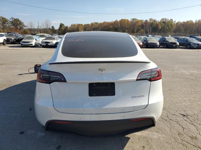 Photo 6 from auction – 2022 TESLA MODEL Y with VIN 7SAYGDEF5NF313270