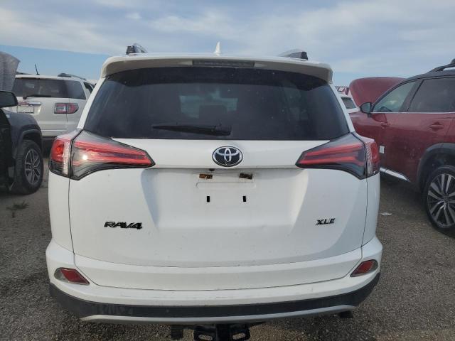 Photo 6 from auction – 2016 TOYOTA RAV4 XLE with VIN 2T3WFREV2GW282536