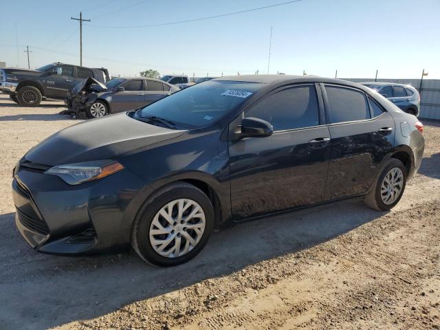 TOYOTA COROLLA L 2017 with VIN 5YFBURHE9HP702966 - Photo from auction
