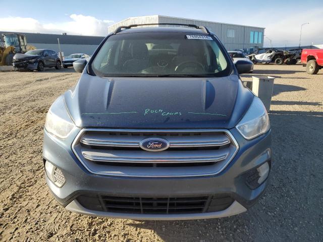 Photo 5 from auction – 2018 FORD ESCAPE SE with VIN 1FMCU9GD0JUB32647