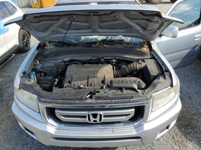 Photo 11 from auction – 2011 HONDA RIDGELINE with VIN 5FPYK1F45BB007356