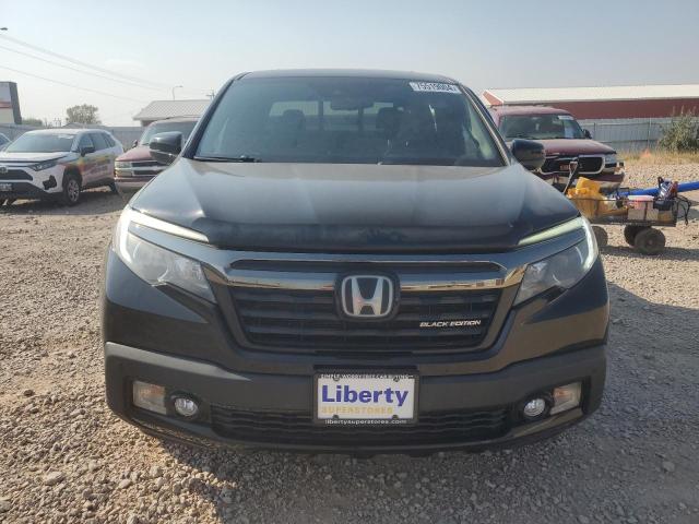 Photo 5 from auction – 2018 HONDA RIDGELINE with VIN 5FPYK3F89JB004537