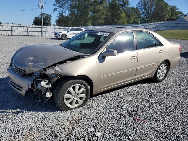TOYOTA CAMRY LE 2003 with VIN 4T1BE32K73U206841 - Photo from auction