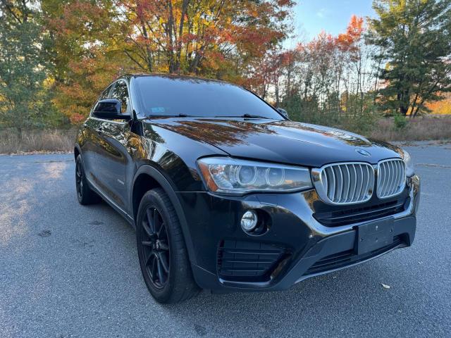 BMW X4 XDRIVE2 2015 with VIN 5UXXW3C56F0M86780 - Photo from auction