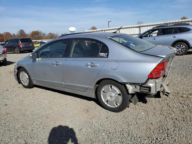 Photo 2 from auction – 2006 HONDA CIVIC HYBR with VIN JHMFA36276S009565