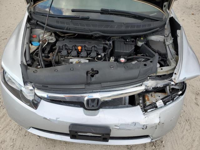 Photo 11 from auction – 2007 HONDA CIVIC LX with VIN 2HGFA16567H305185