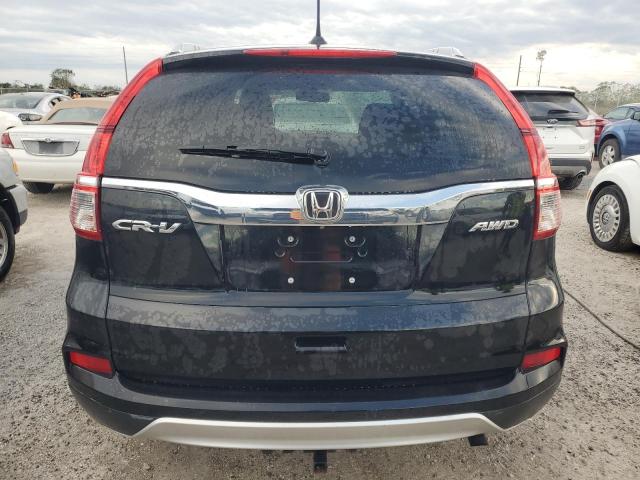 Photo 6 from auction – 2016 HONDA CR-V EXL with VIN 2HKRM4H70GH698949