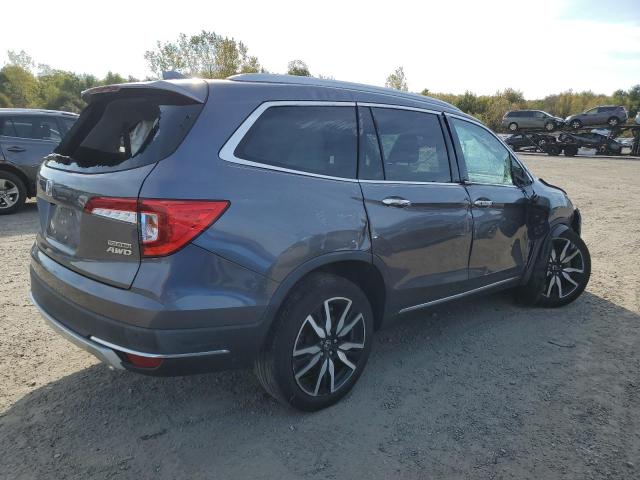 Photo 3 from auction – 2021 HONDA PILOT TOUR with VIN 5FNYF6H94MB032299
