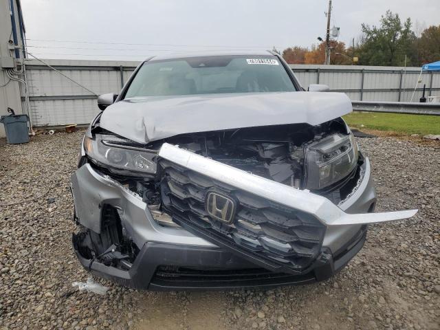Photo 5 from auction – 2022 HONDA PASSPORT E with VIN 5FNYF8H57NB022439
