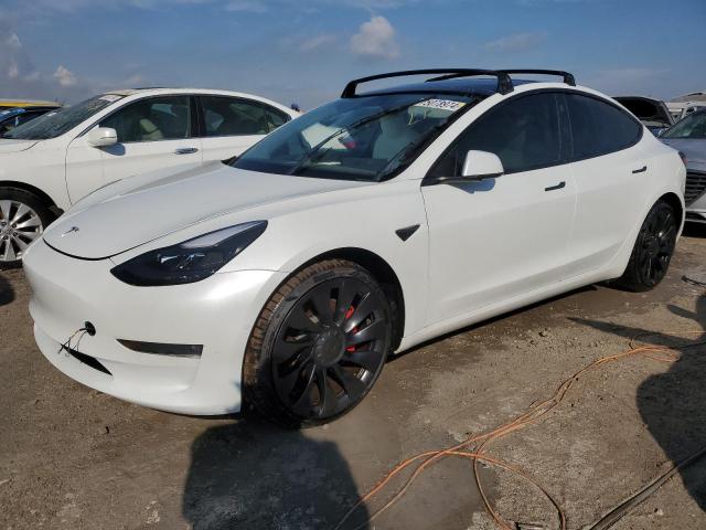 TESLA MODEL 3 2022 with VIN 5YJ3E1ECXNF199283 - Photo from auction
