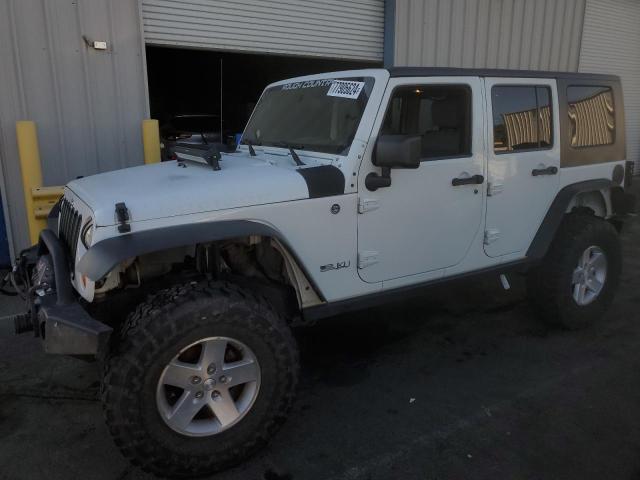 JEEP WRANGLER U 2009 with VIN 1J4GA69129L778574 - Photo from auction
