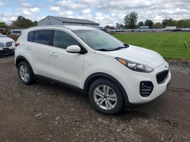 Photo 4 from auction – 2018 KIA SPORTAGE L with VIN KNDPMCAC8J7396149