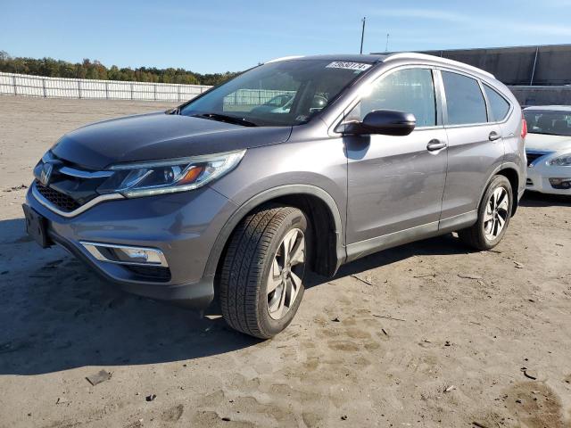 Photo 1 from auction – 2016 HONDA CR-V TOURI with VIN 5J6RM4H99GL106598