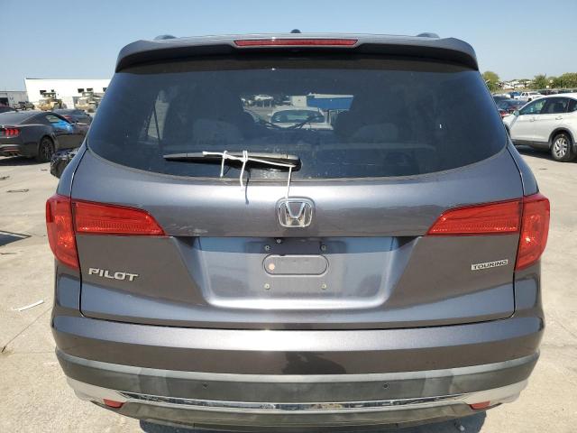 Photo 6 from auction – 2018 HONDA PILOT TOUR with VIN 5FNYF5H91JB001940