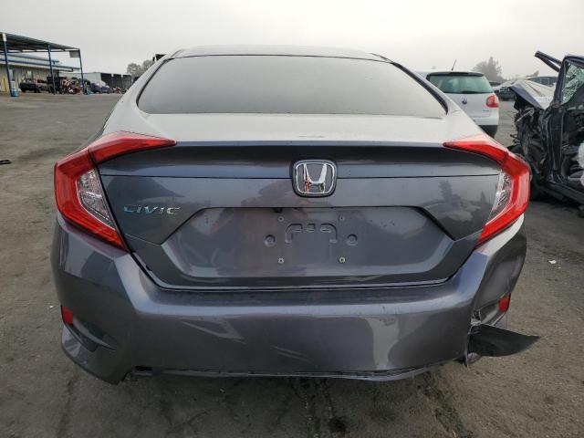 Photo 6 from auction – 2021 HONDA CIVIC LX with VIN 2HGFC2F64MH529110
